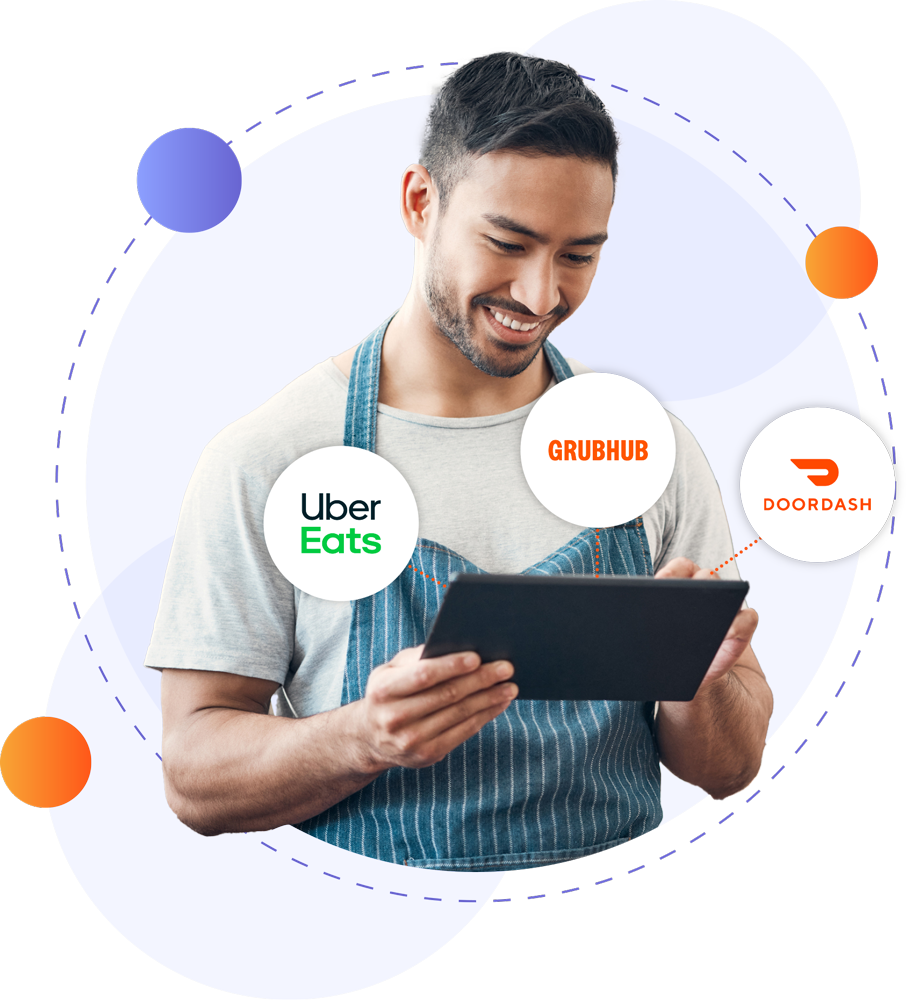 Restaurant staff looking at delivery integrations on a tablet